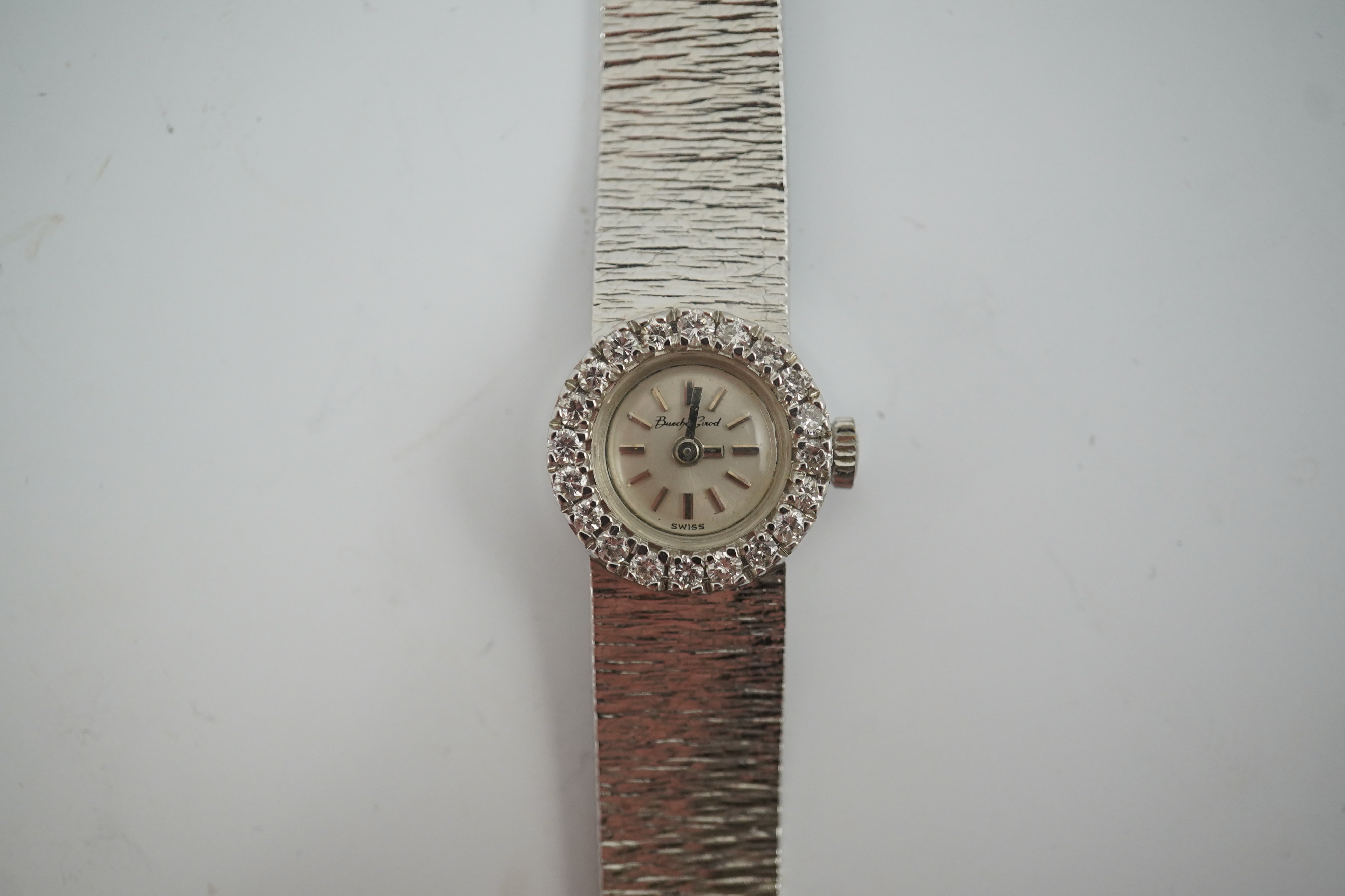 A lady's 9ct white gold and diamond set Bueche Girod manual wind wrist watch